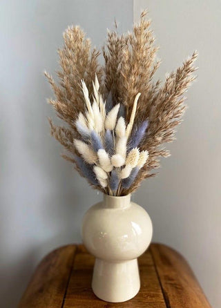 Mushroom vase with lilac bunch